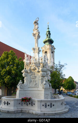 Hainburg an der Donau: Main square with the parish church and Marian column, Austria, Niederösterreich, Lower Austria, Donau Stock Photo