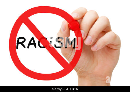 Hand drawing Racism prohibition sign concept with marker on transparent wipe board. Stock Photo