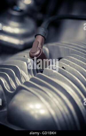 Close up with a motorcycle spark plug. Stock Photo