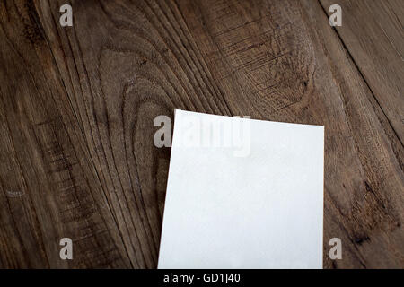 white paper on wood background Stock Photo