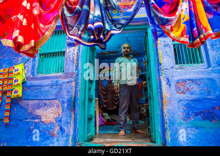 Street vendor selling saris in Jodhpur, the Blue City, Rajasthan, India, Asia Stock Photo