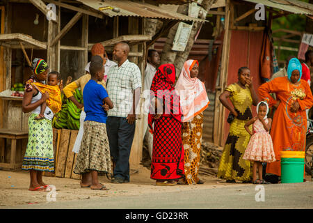 Locals at the bus stop in Dar-es-Salaam, Tanzania, East Africa, Africa Stock Photo