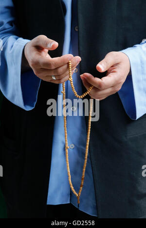 Naqshbandi Muslim praying with prayer beads, Lefke, Cyprus, Europe Stock Photo