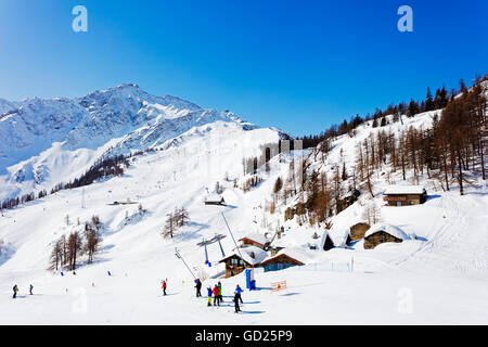 winter in the italian alps, with the ski slope full of snow Stock Photo ...