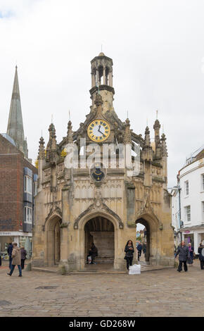 CHICHESTER, ENGLAND - OCTOBER 22, 2015: Unknown people in front of the Chichester clock tower. Chichester is a cathedral city in Stock Photo