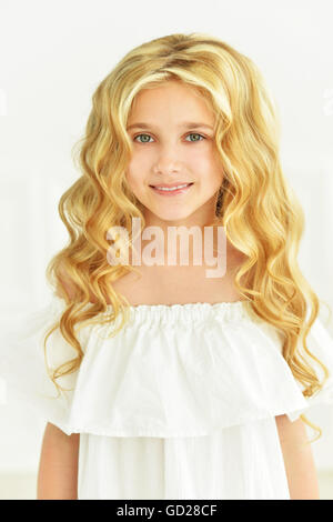 little girl posing in white dress Stock Photo - Alamy
