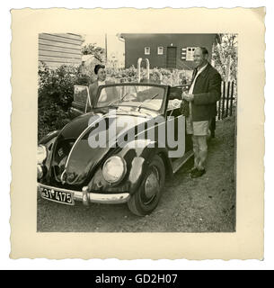 transport / transportation, car, vehicle variants, Volkswagen, one of the first VW cabriolets, produced by body maker Karmann since June 1949, Osnabrueck, proud owner with their new VW beetle cabriolet, Leutkirch, Germany, circa 1950, Additional-Rights-Clearences-Not Available Stock Photo