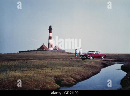 transport / transportation,cars,Volkswagen,VW 1600 Karmann-Ghia Coupe,vehicle variants 34,in front of the Westerheversand lighthouse,peninsula Eiderstedt,Schleswig-Holstein,1968 / 1969,vehicle,vehicles,people,women,female,North Frisia,Friesland,Westerhever,West Germany,Western Germany,Schleswig - Holstein,60s,20th century,Karmann Ghia,1960s,transport,transportation,cars,car,convertible,cabriolet,convertibles,cabriolets,vehicle variants,vehicle variants,lighthouse,lighthouses,peninsula,peninsulas,peninsulae,Schleswig-Holste,Additional-Rights-Clearences-Not Available Stock Photo