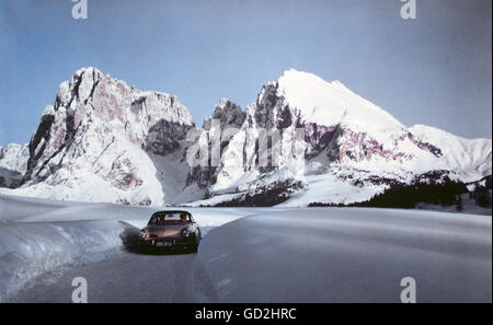transport / transportation, cars, Volkswagen, VW 1600 Karmann-Ghia coupe, vehicle variants 34, in the background Langkofel and Plattkofel, South Tyrol, 1968 / 1969, vehicle, vehicles, people, couple, couples, mounts, mount, mountains, mountain, Alps, Dolomites, Langkofel Mountain range, Sasso Lungo, Sasso Piatto, Italy, winter, snow, 60s, 1960s, Karmann Ghia, 20th century, transport, transportation, cars, car, vehicle variants, vehicle variants, historic, historical, Additional-Rights-Clearences-Not Available Stock Photo