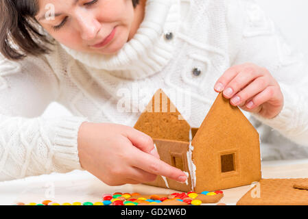 girl prepares a delicious and beautiful Christmas house Stock Photo