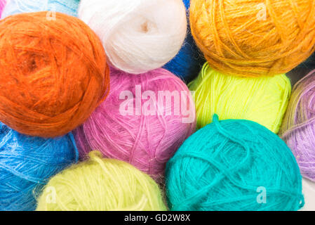 a bunch of multi-colored woolen threads closeup Stock Photo