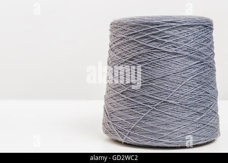 hank of gray woolen threads closeup on a white background Stock Photo