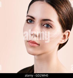 Young female with lifting arrows Stock Photo