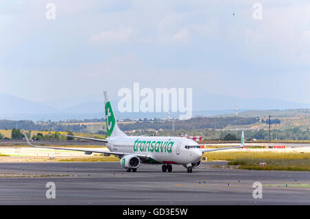 Aircraft -Boeing 737- of -Transavia France- airline, direction to airport terminal of Madrid-Barajas airport Stock Photo