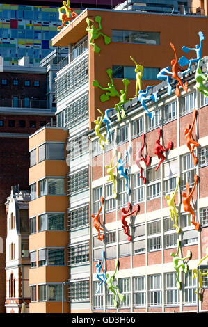 Varied colourful architecture with the Flossies installation by Rosalie in the foreground, Medienhafen media harbour Stock Photo