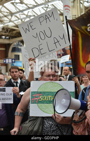 Victoria, London, UK. 11th July 2016. Commuters protest in Victoria Station southern rail Stock Photo