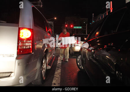 San Juan, Puerto Rico. 21st June, 2013. A homeless man begs for money at an intersection in San Juan, Puerto Rico, June 25, 2013. © Ricardo Arduengo/via ZUMA Wire/ZUMA Wire/Alamy Live News Stock Photo