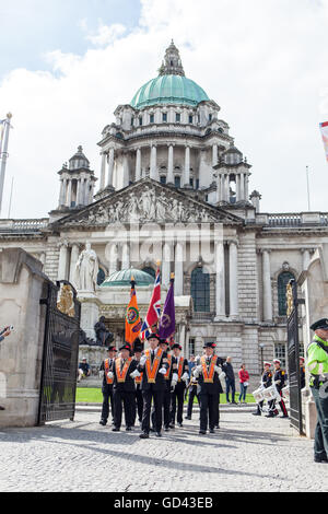 Belfast, UK. 12th July 2016. Membes of the Orange order marching away from the Cenotaph.The Twelfth originated during the late 18th century in Ulster. It celebrates the Glorious Revolution (1688) and victory of Protestant king William of Orange over Catholic king James II at the Battle of the Boyne (1690) Credit:  Bonzo/Alamy Live News Stock Photo