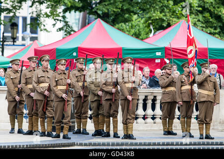 Belfast, UK. 12th July 2016. Orangemen celebrate the Twelfth in World war one army fatigues. It originated during the late 18th century in Ulster. It celebrates the Glorious Revolution (1688) and victory of Protestant king William of Orange over Catholic king James II at the Battle of the Boyne (1690), Credit:  Bonzo/Alamy Live News Stock Photo