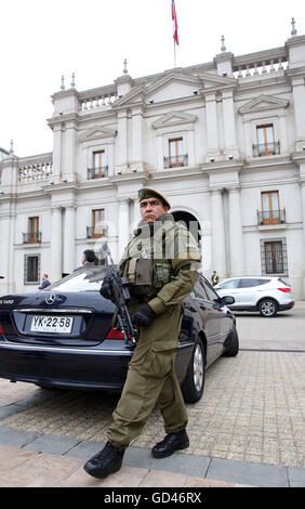 Special action forces of the Chilean army secure the visit of German president Joachim Gauck in front of the presient's palace in Santiago de Chile, Chile, 12 July 2017. The German head of state is on a seven-day visit to CHule and Uruguay. Photo: Wolfgang Kumm/dpa Stock Photo