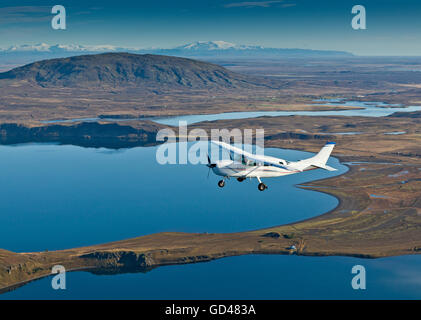 Cessna flying over South Coast, Iceland Stock Photo