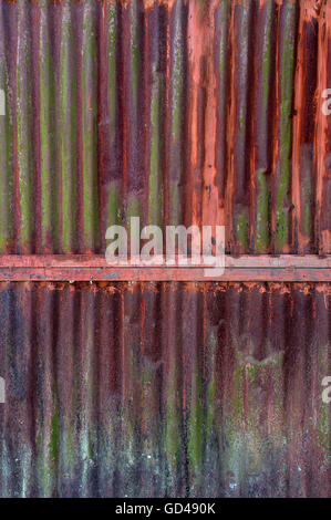 Old rusty zinc plat wall, Zinc wall ,rusty Zinc grunge background. Stock Photo