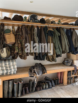 Coat and boot storage Stock Photo