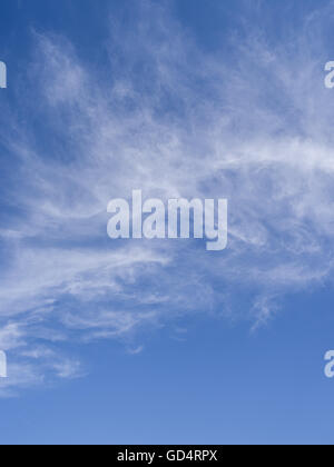 Cirrus clouds in the blue sky. Stock Photo