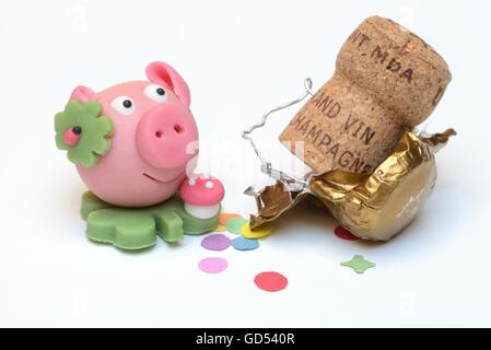lucky pig made from marzipan, and champagne cork Stock Photo