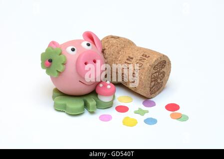 lucky pig made from marzipan, and champagne cork Stock Photo