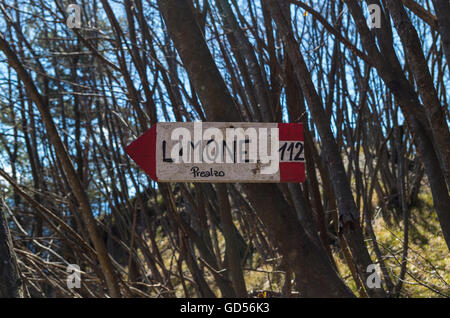 wooden signpost for hikers near Limone at Lake Garda, Italy Stock Photo