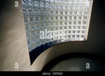 Sun streaming through block glass wall in a stairwell, American College, Bryn Mawr, Pennsylvania, USA Stock Photo