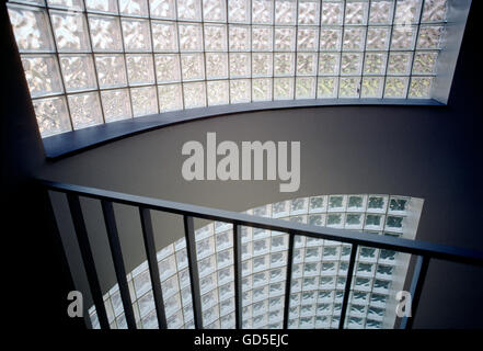 Sun streaming through block glass wall in a stairwell, American College, Bryn Mawr, Pennsylvania, USA Stock Photo