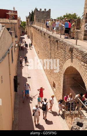 People walking the old town walls, Alcudia, Mallorca, ( Majorca ), Balearic Islands, Spain Europe Stock Photo
