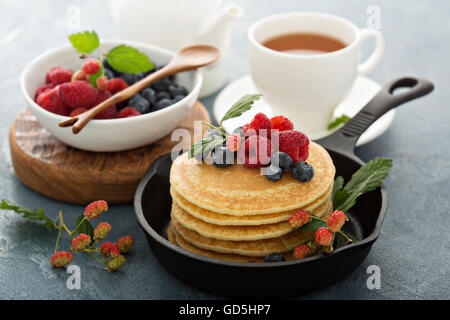 Fluffy buttermilk pancakes with fresh berries Stock Photo
