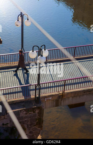 Man walking on the Pont de Sant Agustí, Girona, Catalonia, Spain Stock Photo