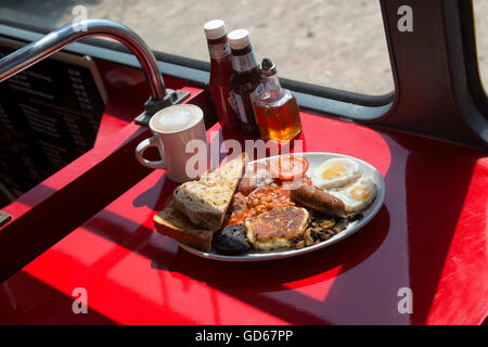 Full English breakfast served on the double decker cafe bus. Hastings. East Sussex, England. UK Stock Photo