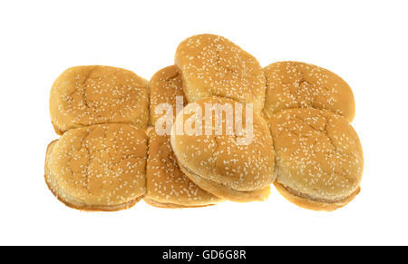 A group of sesame seeded hamburger buns isolated on a white background. Stock Photo