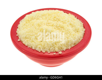 A small bowl filled with grated Pecorino Romano cheese isolated on a white background. Stock Photo