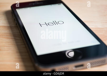 Bangkok, Thailand - March 23, 2016 : Apple iPhone5s showing its screen "Hello", when the software has been updated. Stock Photo