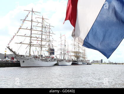 Tallships Dar Młodzieży, Statsraad Lehmkuhl & Kruzenshtern at Delfsail Sailing Event, July 2016. Dutch Flag flying in foreground Stock Photo