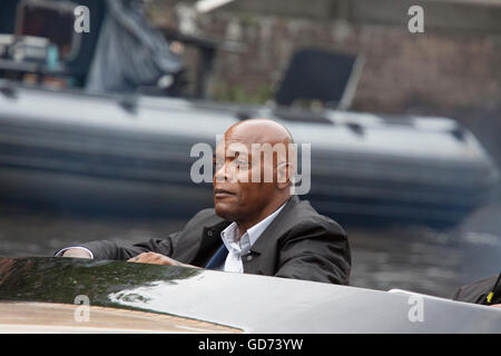 AMSTERDAM, THE NETHERLANDS ,JULY 10 2016;closeup photo of the Famous american actor Samuel L Jackson in a l speedboat while shoo