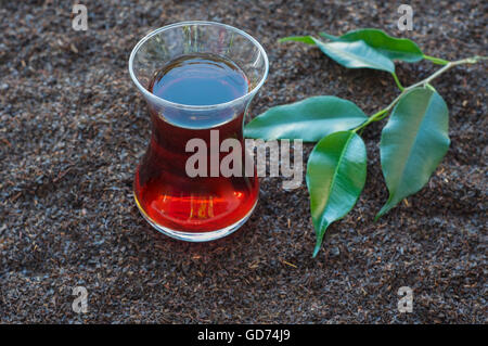 Tea in the Turkish glass beaker is dry black tea Stock Photo