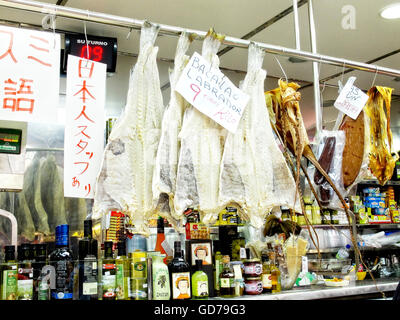 Dried and salted cod in a stall of a european market. Stock Photo