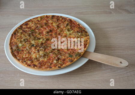 pizza, white plate, scoop, single, anchovy, baking, basil, bell pepper, boletus, courgette, dough, gridiron, mozzarella Stock Photo