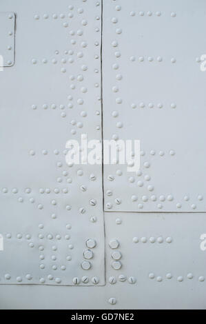 texture light skin of the aircraft with rivets Stock Photo