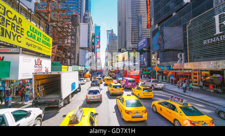 New York City - April 22, 2016: Times Square, featured with Broadway Theaters and animated LED signs, is a symbol of New York Ci Stock Photo