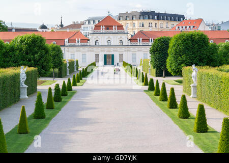 View of Belvedere gardens with people and Lower Belvedere Palace in Vienna, Austria Stock Photo