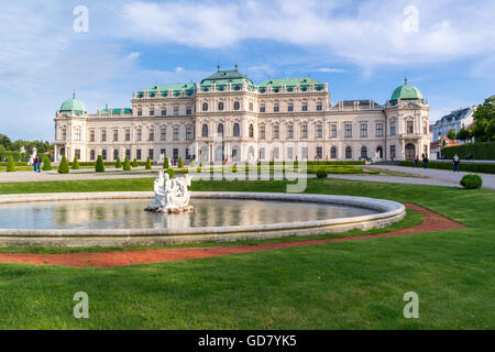 Belvedere gardens with pool, people and Upper Belvedere Palace in Vienna, Austria Stock Photo