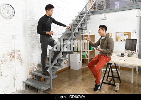 Young designers in the studio to discuss Stock Photo